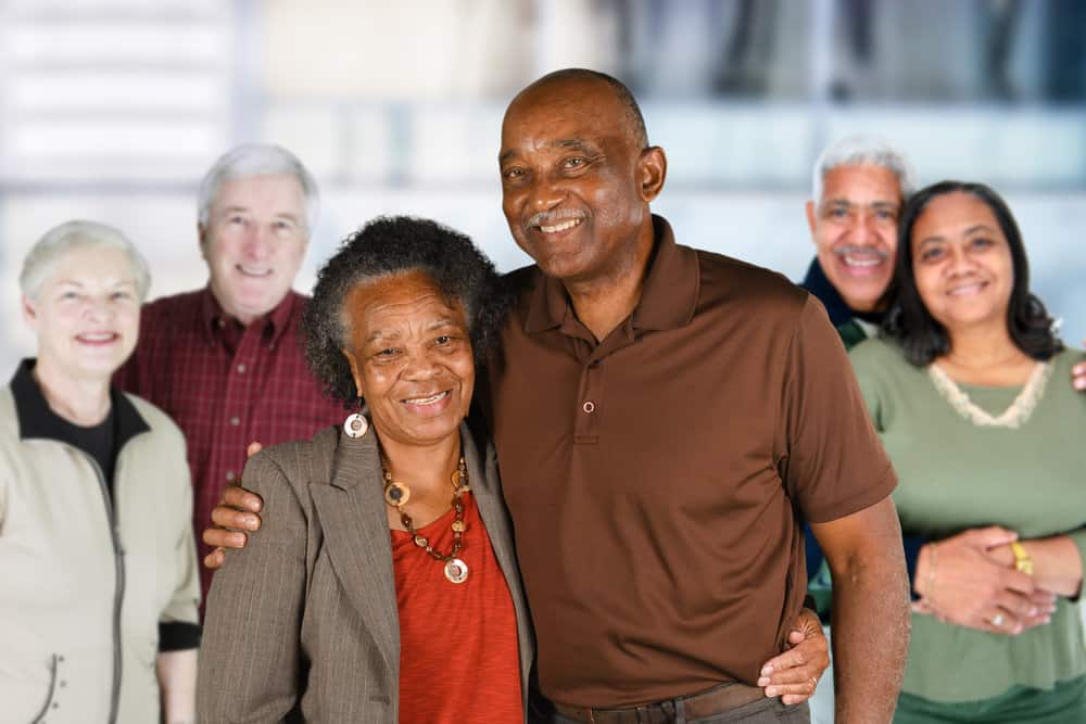 Elderly couples smiling